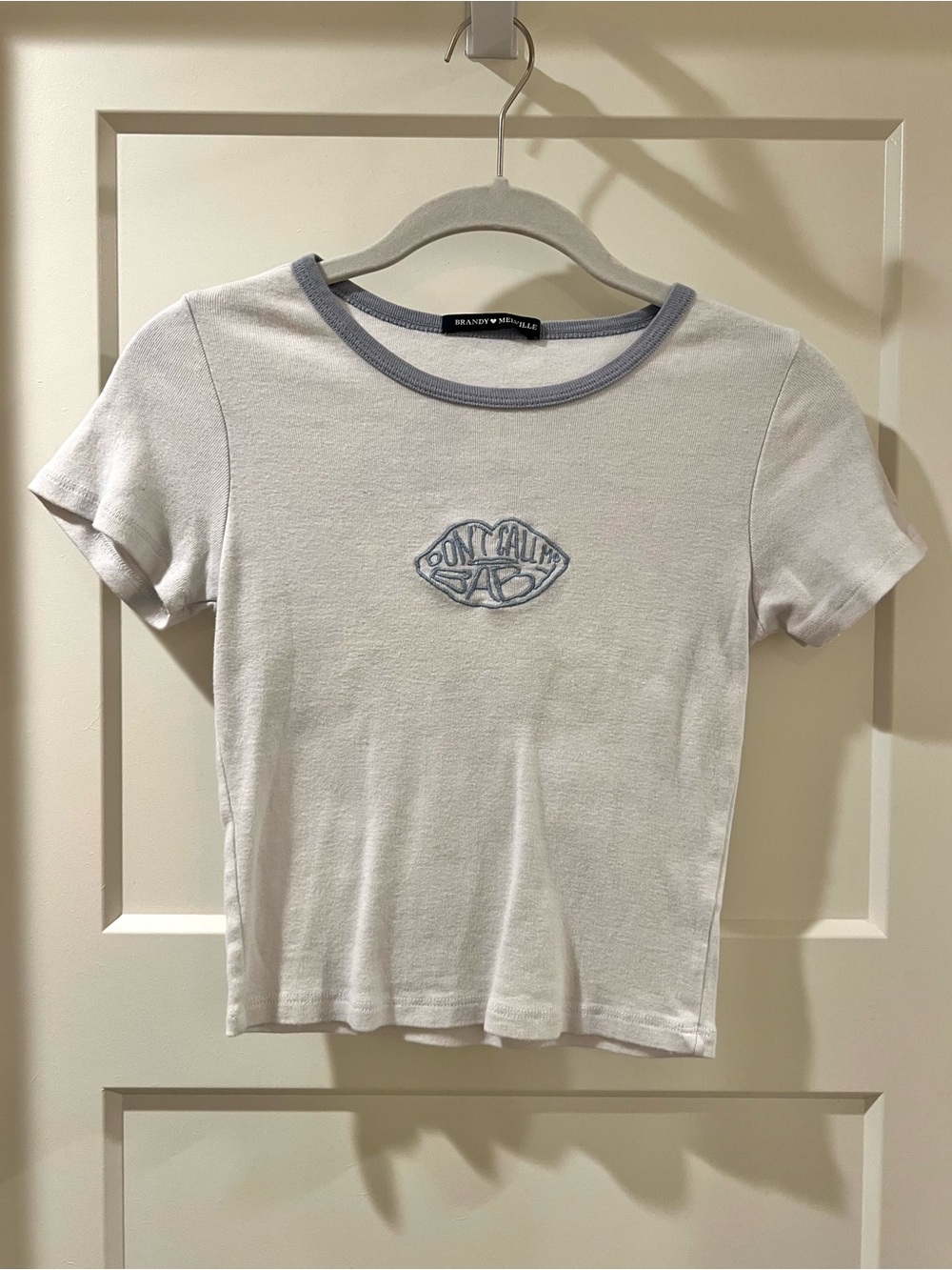 Brandy Melville White Tee with Light Blue Trim and Embroidered Lip